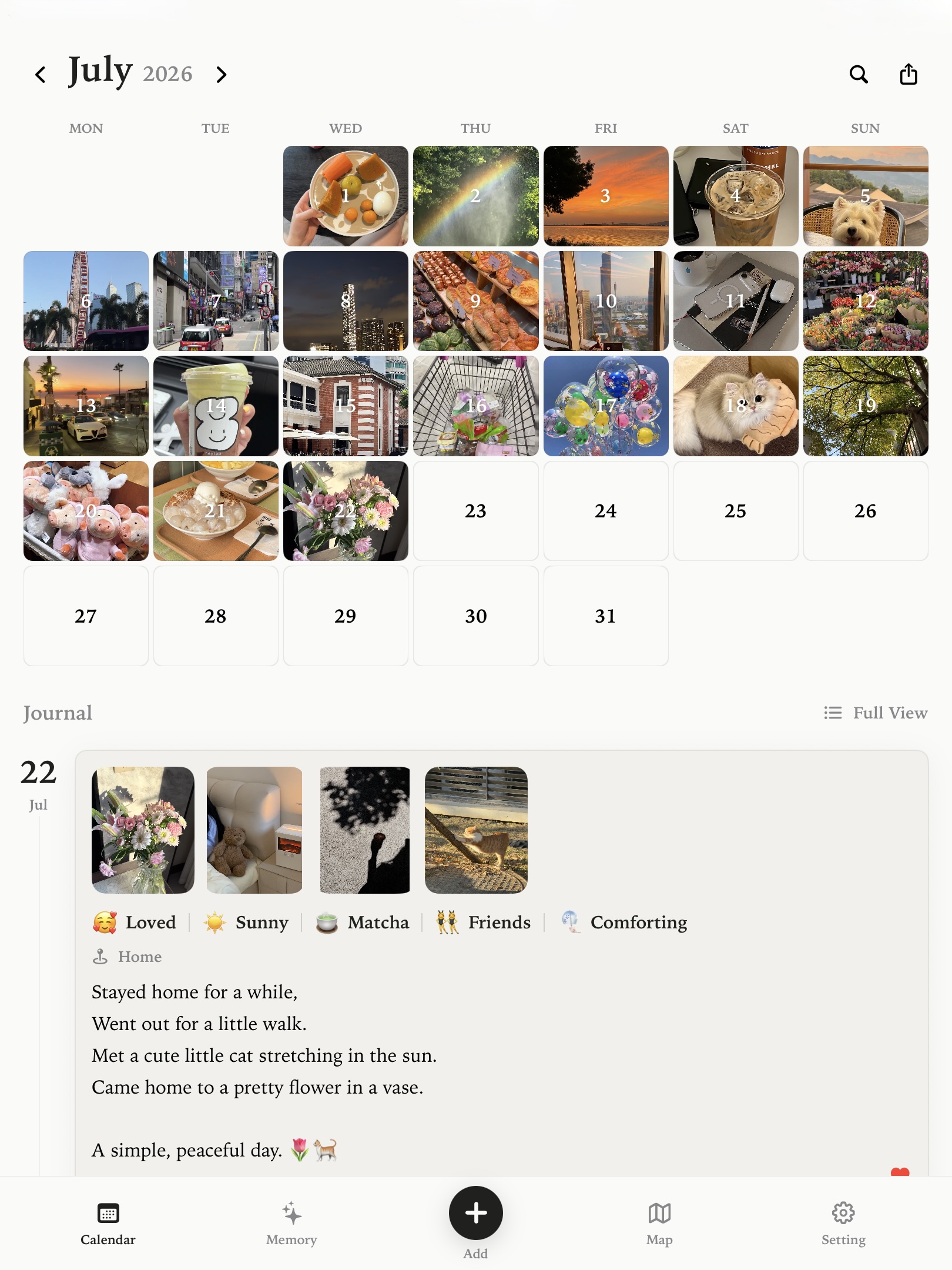 Molog photo calendar month view filled with daily memories.